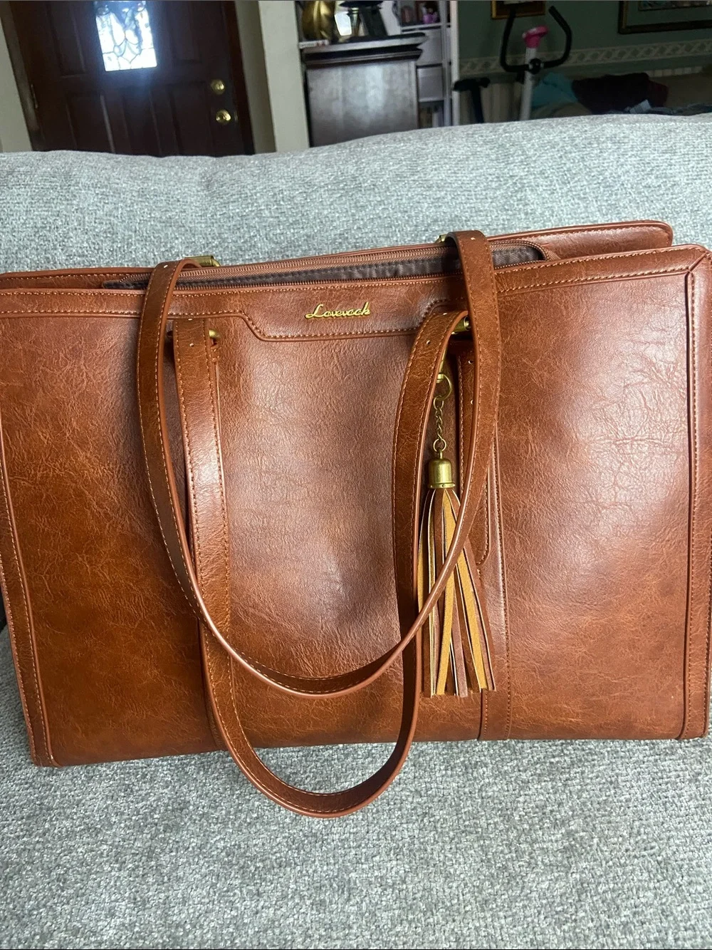 Leather-Textured Tan Tote with Tassel Accent for laptop work